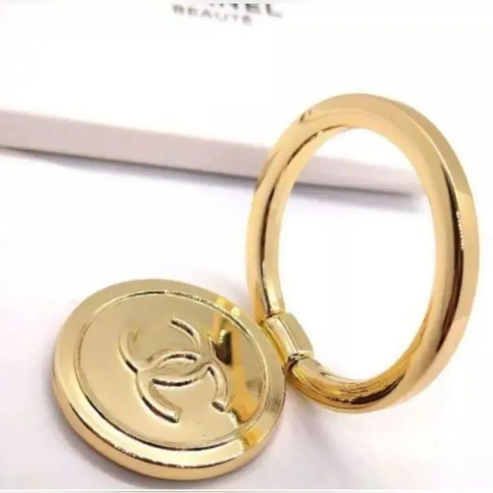 CHANEL INTERLOCHEN CC RING PHONE HOLDER GOLD TONE GWP IN ITS ORIGINAL PA…